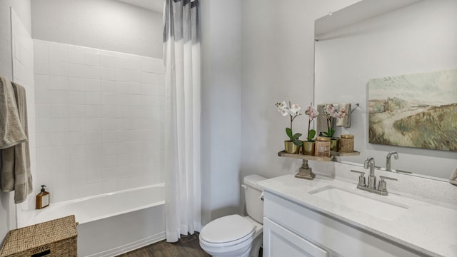 13702 Bothwell Pl, Manor, TX 78653 - bathroom featuring toilet, vanity, shower / bath combination with curtain, and wood finished floors