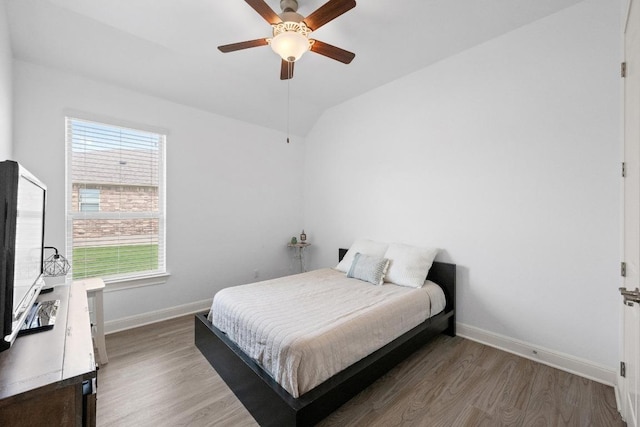 2565 Reunion Blvd, Austin, TX 78737 - bedroom featuring wood finished floors, baseboards, lofted ceiling, and ceiling fan