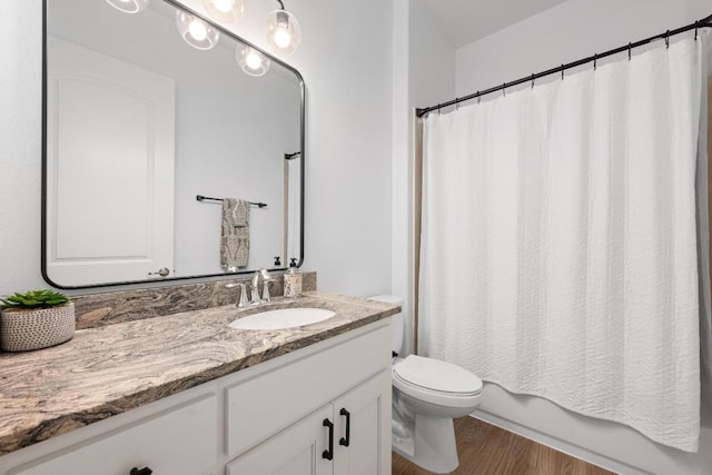 2565 Reunion Blvd, Austin, TX 78737 - bathroom with vanity, toilet, and wood finished floors
