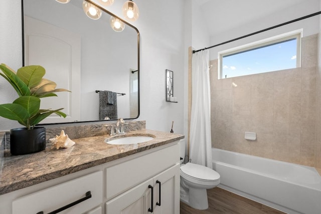2565 Reunion Blvd, Austin, TX 78737 - full bathroom with wood finished floors, vanity, toilet, and shower / bath combination with curtain