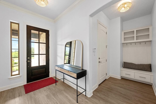 2565 Reunion Blvd, Austin, TX 78737 - entryway with arched walkways, wood finished floors, ornamental molding, and baseboards