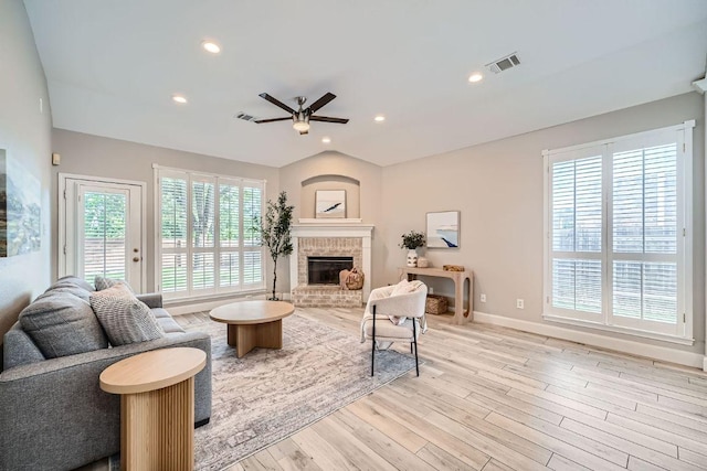 1237 Fall Creek Loop, Cedar Park, TX 78613 - living room with a ceiling fan, a fireplace, baseboards, wood finished floors, and recessed lighting