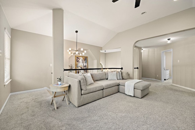1237 Fall Creek Loop, Cedar Park, TX 78613 - carpeted living area with vaulted ceiling, baseboards, a ceiling fan, a chandelier, and arched walkways
