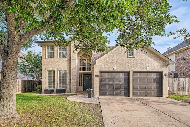 1237 Fall Creek Loop, Cedar Park, TX 78613 - traditional-style house with concrete driveway, a garage, and brick siding
