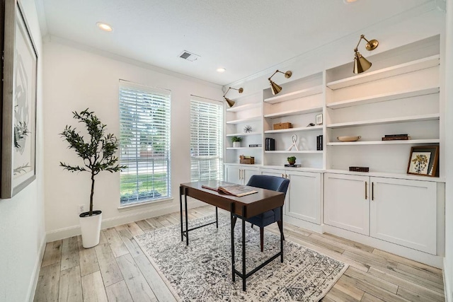 1237 Fall Creek Loop, Cedar Park, TX 78613 - office area with light wood finished floors, baseboards, ornamental molding, and recessed lighting