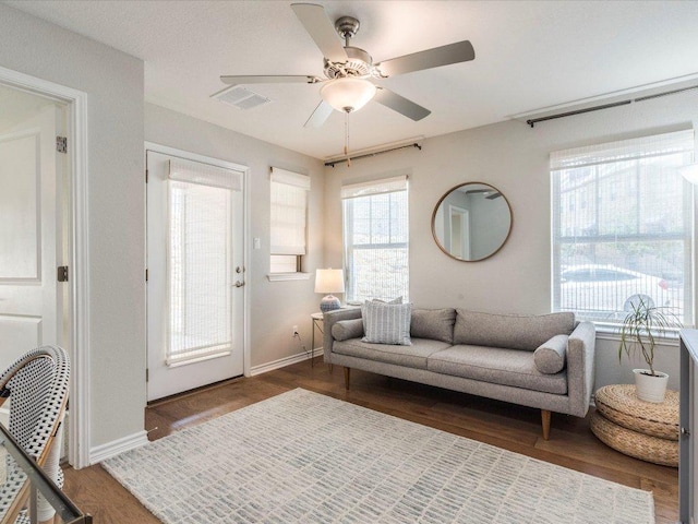 332 Adams St, Georgetown, TX 78628 - living room with ceiling fan, wood finished floors, and baseboards
