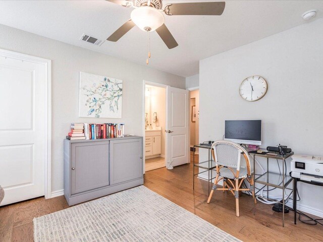 332 Adams St, Georgetown, TX 78628 - office area featuring ceiling fan, wood finished floors, and baseboards