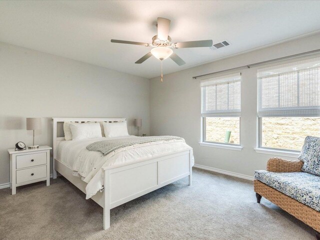 332 Adams St, Georgetown, TX 78628 - bedroom with carpet, baseboards, and ceiling fan