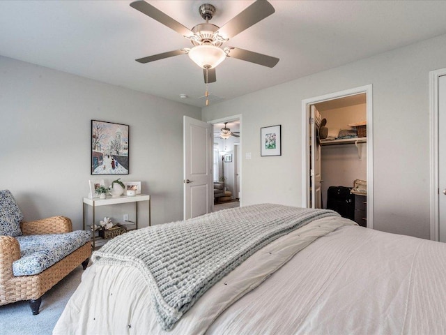 332 Adams St, Georgetown, TX 78628 - bedroom featuring ceiling fan, a walk in closet, and a closet