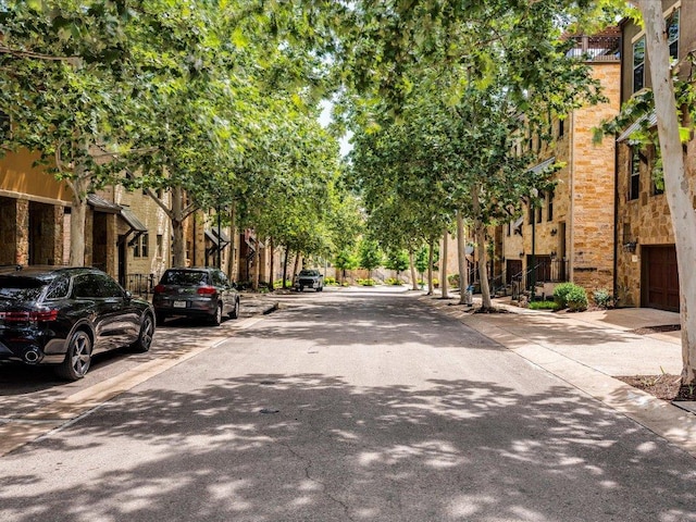 332 Adams St, Georgetown, TX 78628 - view of asphalt road with sidewalks and curbs