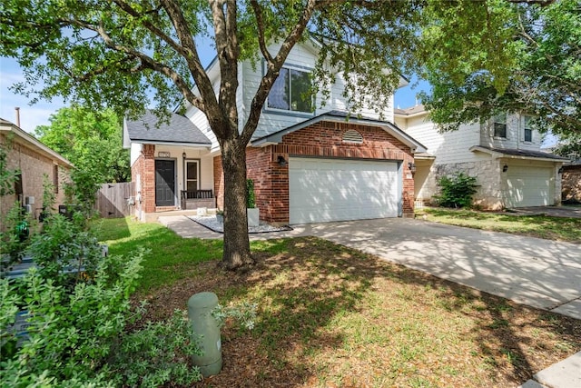 11710 Raymond C Ewry Ln, Austin, TX 78748 - view of front facade with a garage, brick siding, and concrete driveway