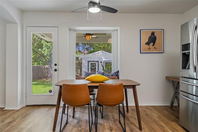 11710 Raymond C Ewry Ln, Austin, TX 78748 - dining area featuring wood finished floors, ceiling fan, and baseboards