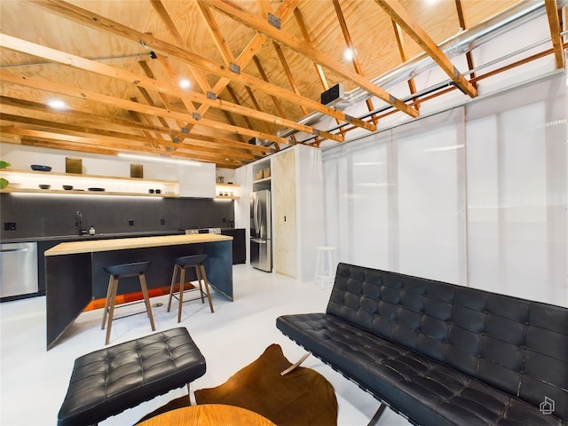 6007 Leisure Run Rd, Austin, TX 78745 - living room featuring concrete floors and lofted ceiling