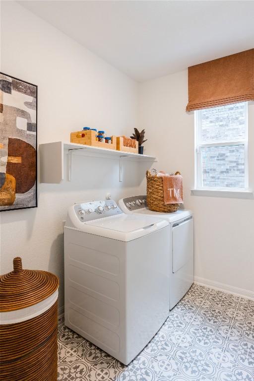1403 Plum Tree Way, Georgetown, TX 78628 - laundry area featuring washer and clothes dryer and baseboards