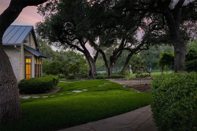 3020 Maravillas Loop, Austin, TX 78735 - yard at dusk with a yard
