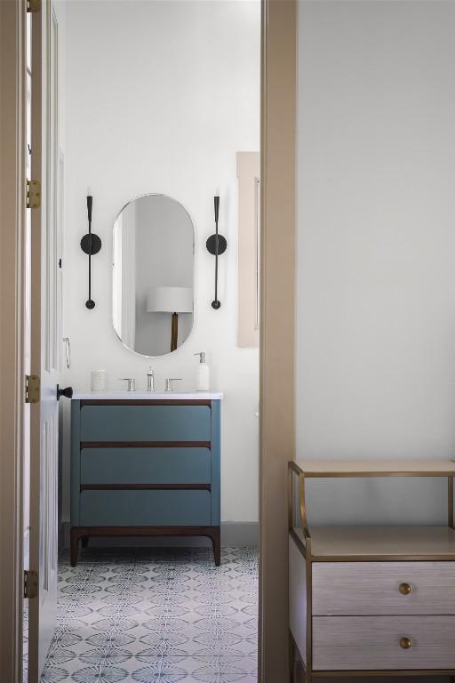 3020 Maravillas Loop, Austin, TX 78735 - bathroom with vanity, tile patterned floors, and baseboards