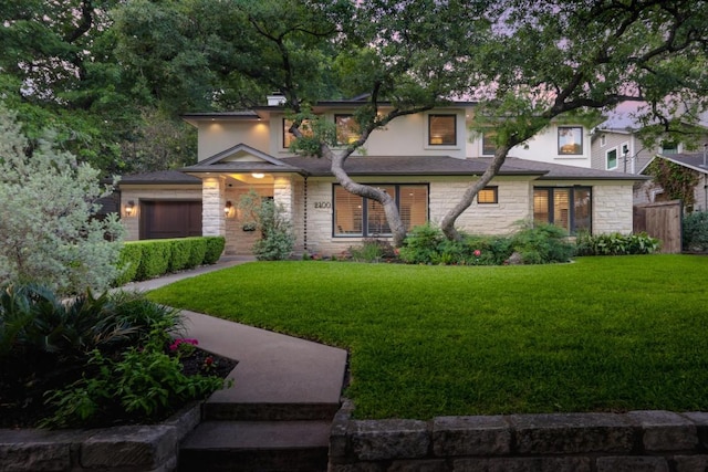 2400 Pruett St, Austin, TX 78703 - view of front of property with stone siding, a front lawn, and stucco siding