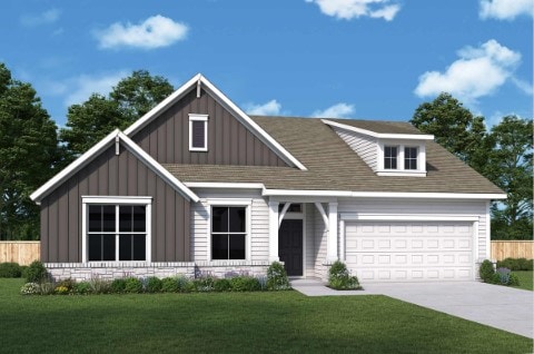 594 Texas Sage Loop, Buda, TX 78610 - view of front of home with an attached garage, board and batten siding, and concrete driveway