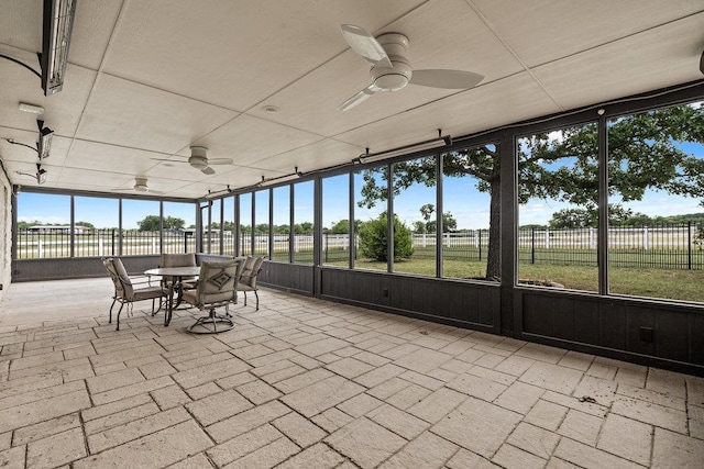 204 Bridges Ln, Buda, TX 78610 - sunroom featuring ceiling fan and outdoor dining space