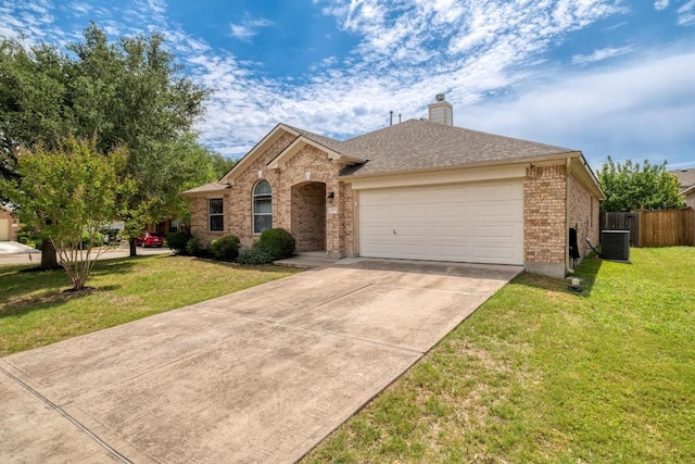 18725 Dry Lake Ln, Pflugerville, TX 78660 - view of front of house with brick siding, an attached garage, driveway, a chimney, and cooling unit