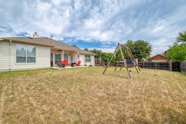 18725 Dry Lake Ln, Pflugerville, TX 78660 - view of yard featuring a playground and a patio