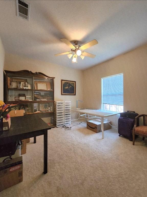 1726 Riverchase Ave, Smithville, TX 78957 - carpeted home office with ceiling fan