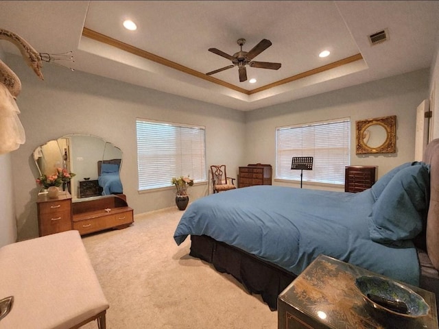 1726 Riverchase Ave, Smithville, TX 78957 - carpeted bedroom with a tray ceiling, recessed lighting, crown molding, ceiling fan, and baseboards