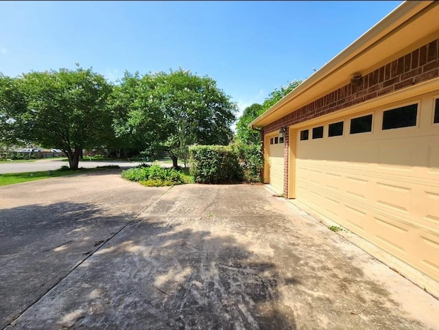 1726 Riverchase Ave, Smithville, TX 78957 - garage with concrete driveway