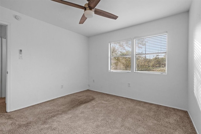 4413 Whispering Valley Dr, Austin, TX 78727 - carpeted empty room with ceiling fan and baseboards