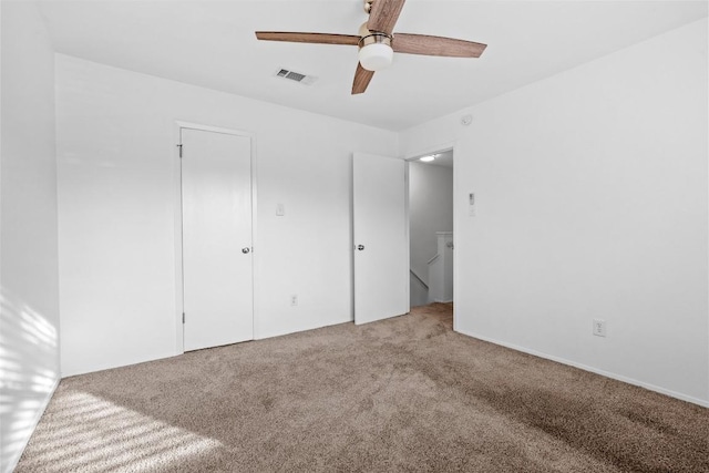 4413 Whispering Valley Dr, Austin, TX 78727 - unfurnished bedroom with carpet floors and ceiling fan