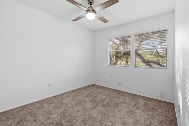 4413 Whispering Valley Dr, Austin, TX 78727 - carpeted empty room featuring a ceiling fan and baseboards