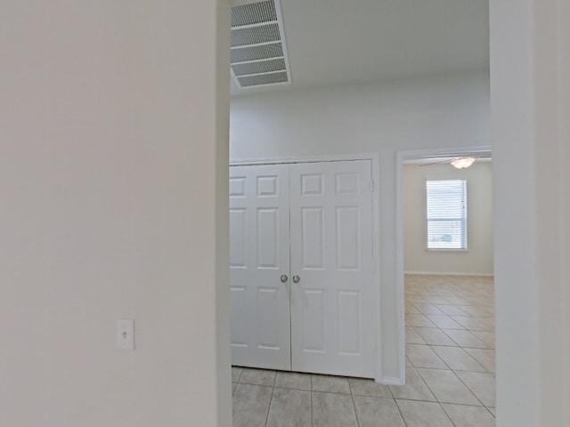 10116 Aly May Dr, Austin, TX 78748 - corridor featuring light tile patterned floors and baseboards