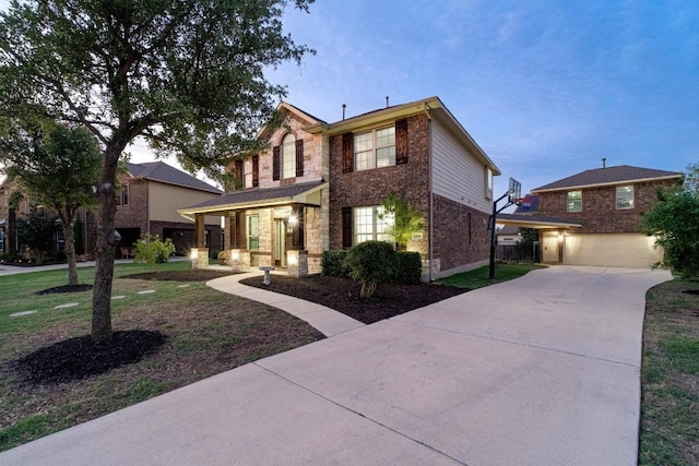 5109 Scenic Lake Dr, Georgetown, TX 78626 - traditional-style home featuring driveway, brick siding, and a garage