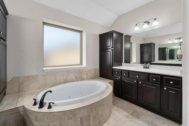 5109 Scenic Lake Dr, Georgetown, TX 78626 - full bathroom with lofted ceiling, a tub with jets, and vanity