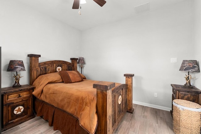 5109 Scenic Lake Dr, Georgetown, TX 78626 - bedroom with light wood-type flooring, baseboards, and ceiling fan