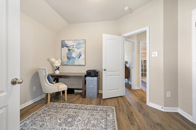 3633 Mineral Dr, Leander, TX 78641 - office with wood finished floors, baseboards, and lofted ceiling