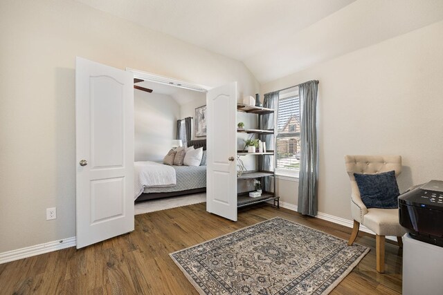 3633 Mineral Dr, Leander, TX 78641 - bedroom featuring lofted ceiling, baseboards, and wood finished floors
