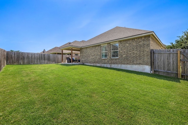 3633 Mineral Dr, Leander, TX 78641 - back of house featuring brick siding and a patio area