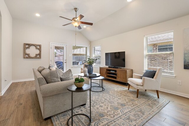 3633 Mineral Dr, Leander, TX 78641 - living area featuring ceiling fan, baseboards, vaulted ceiling, wood finished floors, and recessed lighting