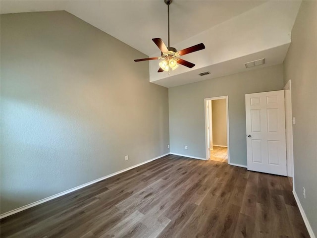 2009 Meadow View Dr, San Marcos, TX 78666 - unfurnished bedroom with dark wood finished floors, baseboards, high vaulted ceiling, and ceiling fan