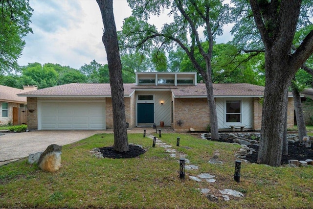 4831 Trail Crest Cir, Austin, TX 78735 - mid-century inspired home with concrete driveway, an attached garage, and brick siding