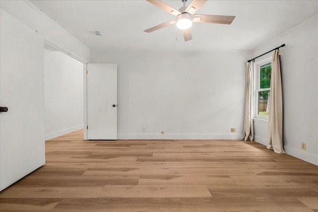 4831 Trail Crest Cir, Austin, TX 78735 - unfurnished room featuring light wood finished floors, a ceiling fan, and crown molding