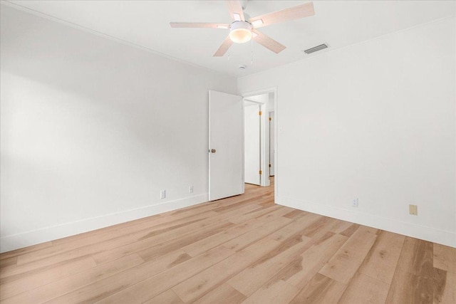 4831 Trail Crest Cir, Austin, TX 78735 - unfurnished room featuring light wood finished floors, baseboards, and a ceiling fan