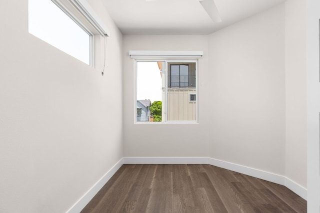 2108 Rosewood Ave Unit A, Austin, TX 78702 - empty room with baseboards and dark wood-type flooring