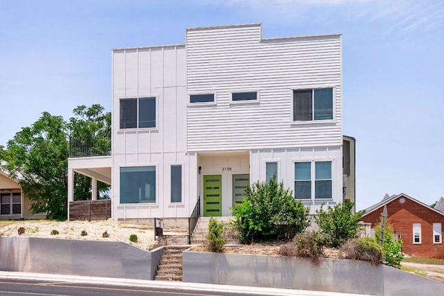 2108 Rosewood Ave Unit A, Austin, TX 78702 - modern home with board and batten siding