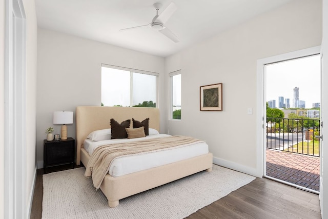 2108 Rosewood Ave Unit A, Austin, TX 78702 - bedroom featuring access to outside, wood finished floors, baseboards, and a ceiling fan