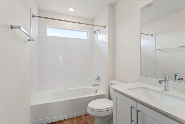 117 Scarborough Way, San Marcos, TX 78666 - bathroom with wood finished floors, vanity, toilet, and shower / washtub combination