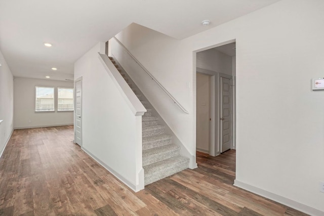 117 Scarborough Way, San Marcos, TX 78666 - staircase featuring wood finished floors, recessed lighting, and baseboards