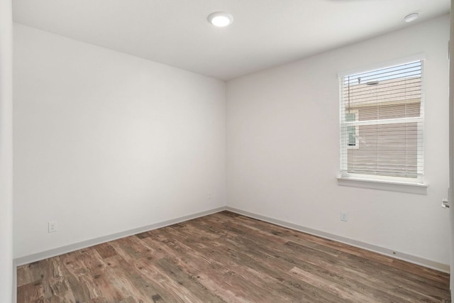 117 Scarborough Way, San Marcos, TX 78666 - spare room featuring wood finished floors and baseboards