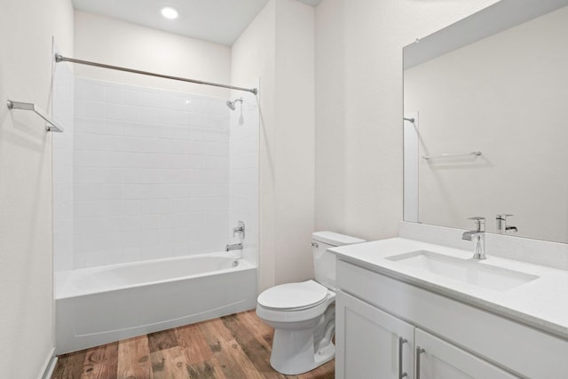 117 Scarborough Way, San Marcos, TX 78666 - full bathroom featuring wood finished floors, toilet, vanity, and shower / bath combination